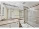 Bright bathroom with granite countertop, updated vanity, and large shower at 1800 Benjamin Franklin Dr # A304, Sarasota, FL 34236