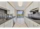 Kitchen features granite countertops, stainless steel appliances, and a view at 1800 Benjamin Franklin Dr # A304, Sarasota, FL 34236