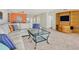 Living room with large sectional sofa and ocean view at 1800 Benjamin Franklin Dr # A304, Sarasota, FL 34236