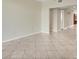 Light and airy living room featuring neutral tile floors at 1800 Benjamin Franklin Dr # A304, Sarasota, FL 34236