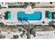 Aerial view of resort-style pool with lounge chairs at 1800 Benjamin Franklin Dr # A304, Sarasota, FL 34236