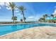 Large beachfront pool with plenty of lounge chairs at 1800 Benjamin Franklin Dr # A304, Sarasota, FL 34236