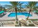Inviting pool and patio area steps from the beach at 1800 Benjamin Franklin Dr # A304, Sarasota, FL 34236