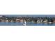 Scenic waterfront view with sailboats and luxury homes at 1800 Benjamin Franklin Dr # A304, Sarasota, FL 34236