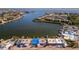 Aerial view of waterfront homes with some damage at 19 Seaside Ct, Holmes Beach, FL 34217