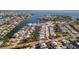 Aerial view of waterfront community with homes and canals at 19 Seaside Ct, Holmes Beach, FL 34217