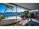 Private dock with boat lift, offering waterfront access at 19 Seaside Ct, Holmes Beach, FL 34217
