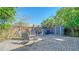 Private backyard with patio, shed, and seating area at 2111 Outer Dr, Sarasota, FL 34231