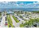 Aerial view of marina, parking lot, and waterfront businesses at 25318 Marion Ave, Punta Gorda, FL 33950