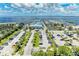 Aerial view showing marina, parking lot, and waterfront area at 25318 Marion Ave, Punta Gorda, FL 33950