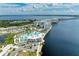Aerial view of resort with pool and parking overlooking the water at 25318 Marion Ave, Punta Gorda, FL 33950