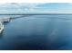 Aerial view of calm water and distant bridge at 25318 Marion Ave, Punta Gorda, FL 33950