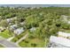 Aerial view showing a property with surrounding houses and vegetation at 25318 Marion Ave, Punta Gorda, FL 33950