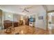 Bedroom with hardwood floors, rocking chair, and built in shelving at 3213 Sumac Ter, Sarasota, FL 34237