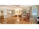 Bedroom with hardwood floors and ensuite bathroom access at 3213 Sumac Ter, Sarasota, FL 34237