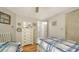Bedroom with two twin beds and dresser at 3213 Sumac Ter, Sarasota, FL 34237