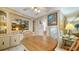 Dining area with wood table and built-in hutch at 3213 Sumac Ter, Sarasota, FL 34237