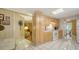 Kitchen with light wood cabinets and white appliances at 3213 Sumac Ter, Sarasota, FL 34237