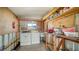 Laundry room with washer, dryer, and workbench at 3213 Sumac Ter, Sarasota, FL 34237