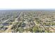 Community aerial shot showcasing tree-lined streets and well-maintained homes at 3623 Monday Ter, North Port, FL 34286