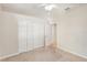 Well-lit bedroom with large closet and carpet flooring at 3623 Monday Ter, North Port, FL 34286