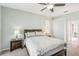 Bright bedroom with double bed, nightstands, and ceiling fan at 3623 Monday Ter, North Port, FL 34286