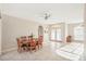 Sunlit dining room with French doors leading to backyard at 3623 Monday Ter, North Port, FL 34286