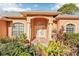 Elegant entryway with arched columns and double doors at 3623 Monday Ter, North Port, FL 34286
