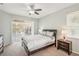 Main bedroom with sliding door to screened patio at 3623 Monday Ter, North Port, FL 34286