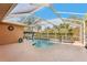 Relaxing screened-in pool and spa with ample patio space at 3623 Monday Ter, North Port, FL 34286