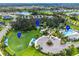 Aerial view showing community amenities including pool, basketball court, and soccer field at 4004 Wildgrass Pl, Parrish, FL 34219