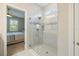 Modern shower with glass enclosure and stylish tile work at 412 Daylily Blvd, Nokomis, FL 34275