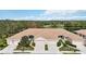 Quadruplex with tile roofs and lush landscaping near lake at 4209 Cascade Falls Dr, Sarasota, FL 34243