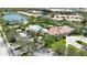 Community pool and clubhouse with ample parking at 4209 Cascade Falls Dr, Sarasota, FL 34243