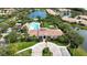 Community clubhouse with pool, spa, and bocce ball courts at 4209 Cascade Falls Dr, Sarasota, FL 34243