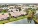 Aerial view of home with lake access at 4209 Cascade Falls Dr, Sarasota, FL 34243