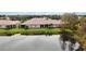 Aerial view of home's backyard and lake view at 4209 Cascade Falls Dr, Sarasota, FL 34243