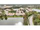 Aerial view of community near lake and road at 4209 Cascade Falls Dr, Sarasota, FL 34243