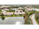 Aerial view showcasing a community near a lake at 4209 Cascade Falls Dr, Sarasota, FL 34243