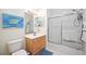 Clean bathroom with single vanity, shower/tub combo and art at 4209 Cascade Falls Dr, Sarasota, FL 34243