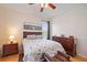 Main bedroom with a queen-size bed, water view, and ample closet space at 4209 Cascade Falls Dr, Sarasota, FL 34243