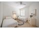 Guest bedroom with twin beds and decorative accents at 4209 Cascade Falls Dr, Sarasota, FL 34243