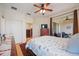 Bedroom with balcony access, ceiling fan, and plenty of closet space at 4209 Cascade Falls Dr, Sarasota, FL 34243