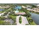 Aerial view of community pool and clubhouse at 4209 Cascade Falls Dr, Sarasota, FL 34243