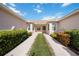Shared courtyard between two units with landscaping at 4209 Cascade Falls Dr, Sarasota, FL 34243