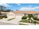 Two-unit home with attached garages and manicured landscaping at 4209 Cascade Falls Dr, Sarasota, FL 34243