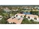 Aerial view of a luxury community with lakefront properties and lush landscaping at 4209 Cascade Falls Dr, Sarasota, FL 34243