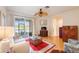 Spacious living room with lake view, comfy seating, and a red rug at 4209 Cascade Falls Dr, Sarasota, FL 34243