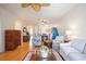 Open living space with hardwood floors, and views to the kitchen and dining areas at 4209 Cascade Falls Dr, Sarasota, FL 34243