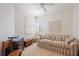 Home office featuring a comfortable sofa and built-in wooden cabinet at 4209 Cascade Falls Dr, Sarasota, FL 34243